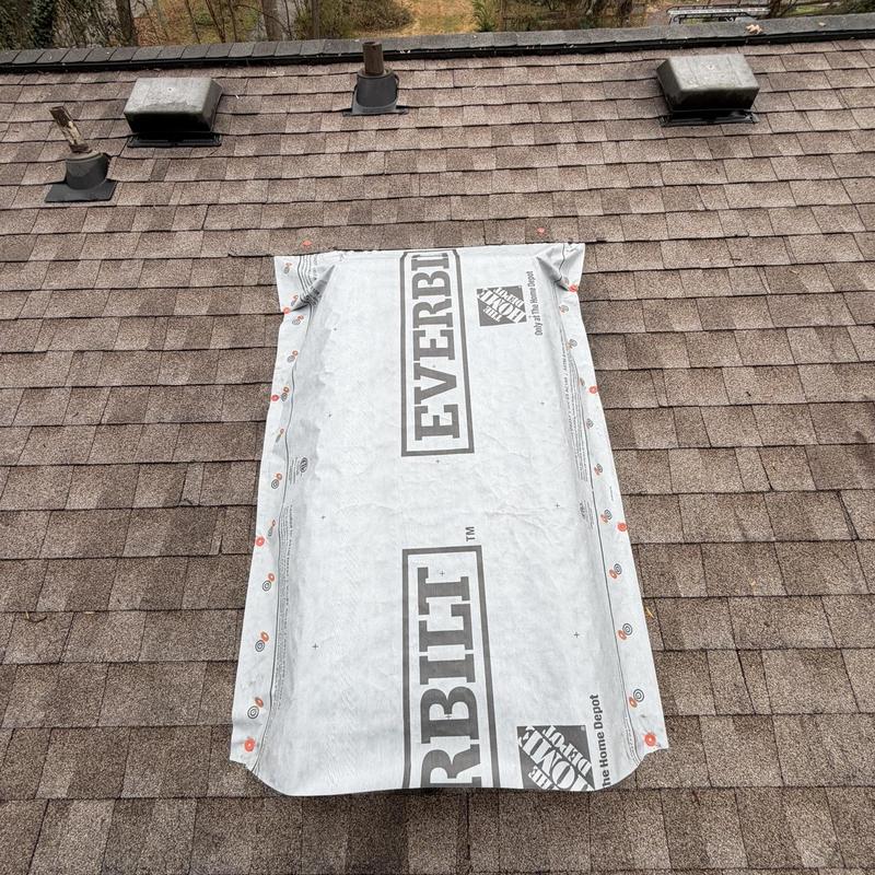 Skylight replacement underlayment on roof shingles
