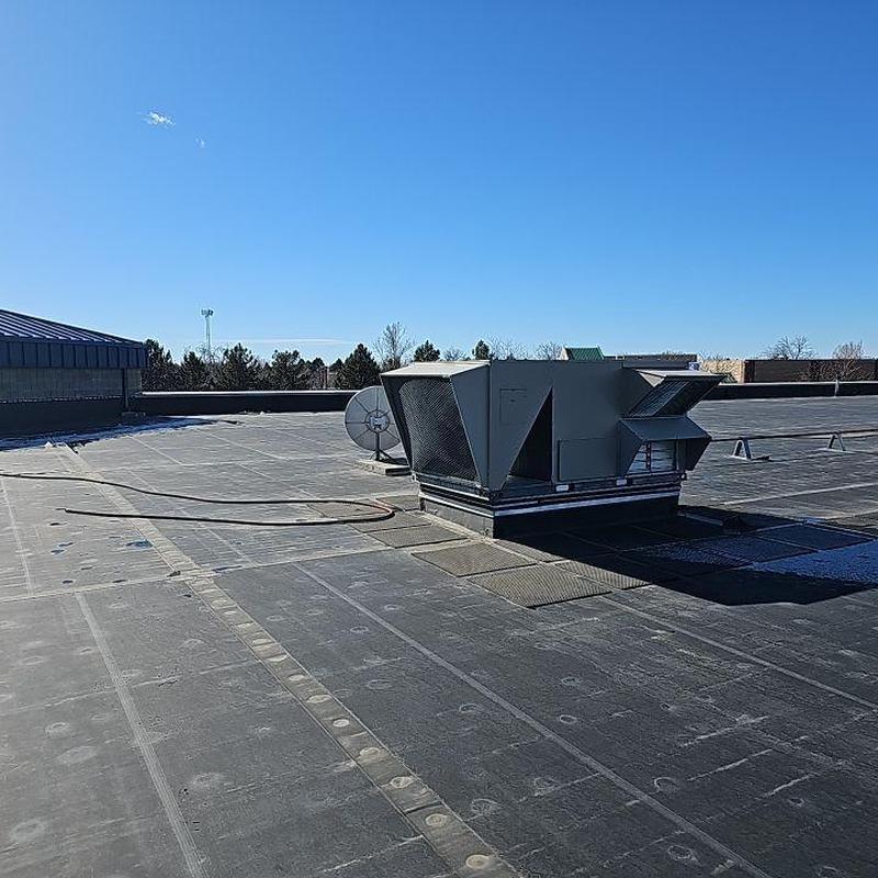 Flat roof membrane with rooftop HVAC unit and vent Flat roof membrane with rooftop HVAC unit and vent