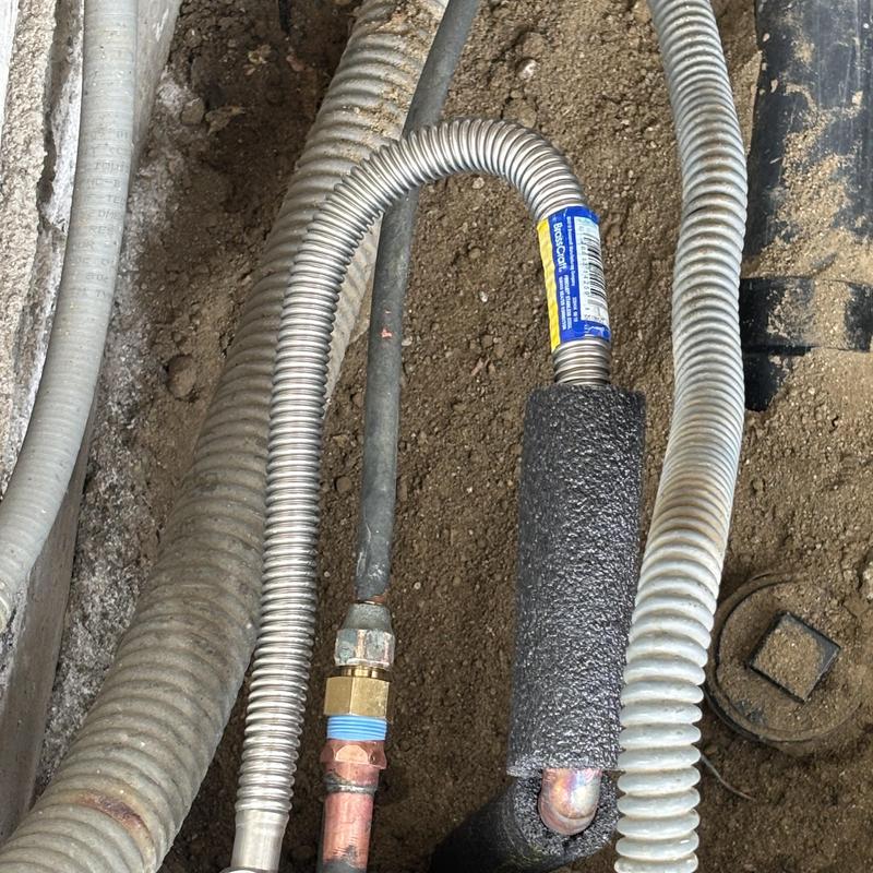 Mobile home water line with insulated copper repair
