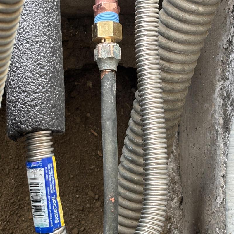 Copper Type L water line connection near crawl hole