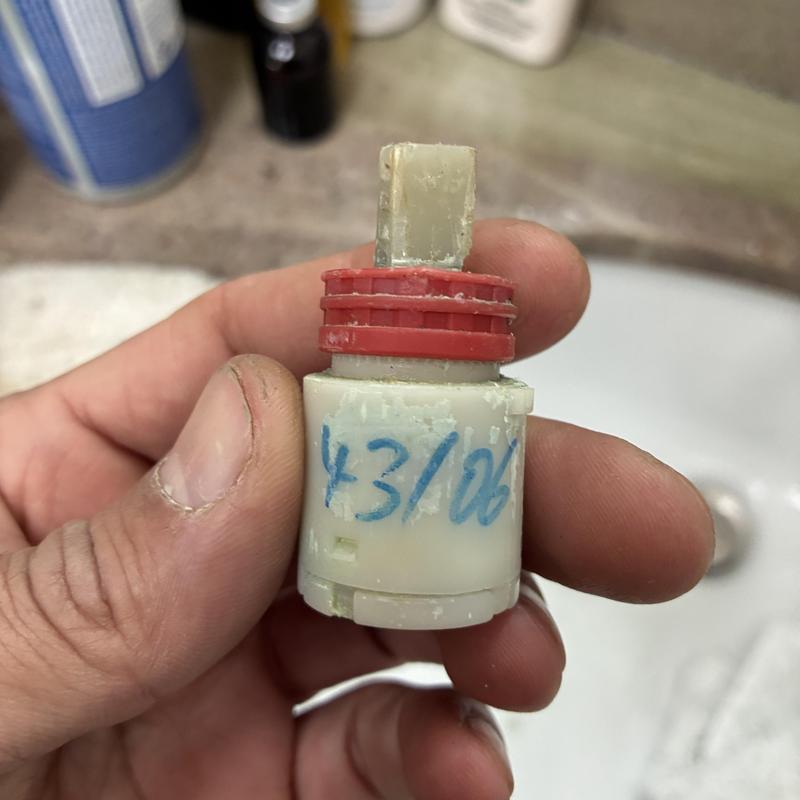 Faucet cartridge removed for basin faucet repair