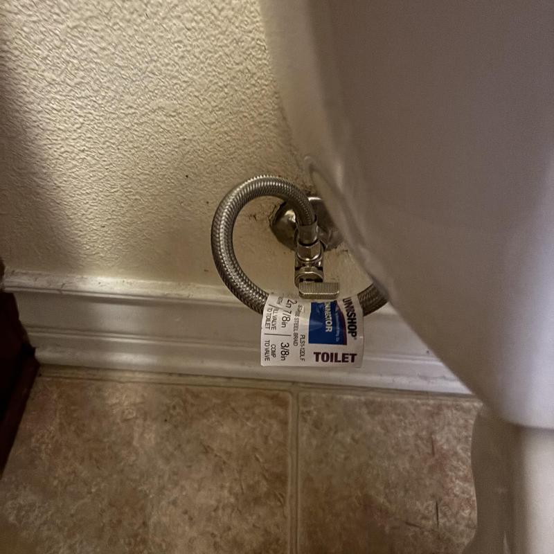 Quarter turn angle stop and supply line behind toilet Quarter turn angle stop and supply line behind toilet