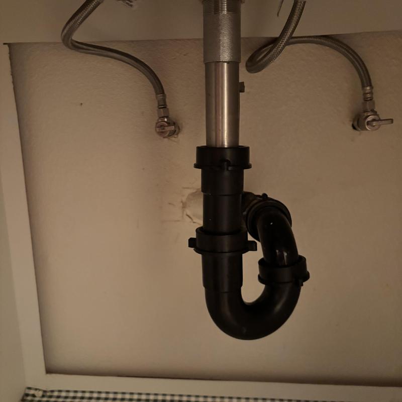 Sink drain trap with angle stop valves and supply lines Sink drain trap with angle stop valves and supply lines