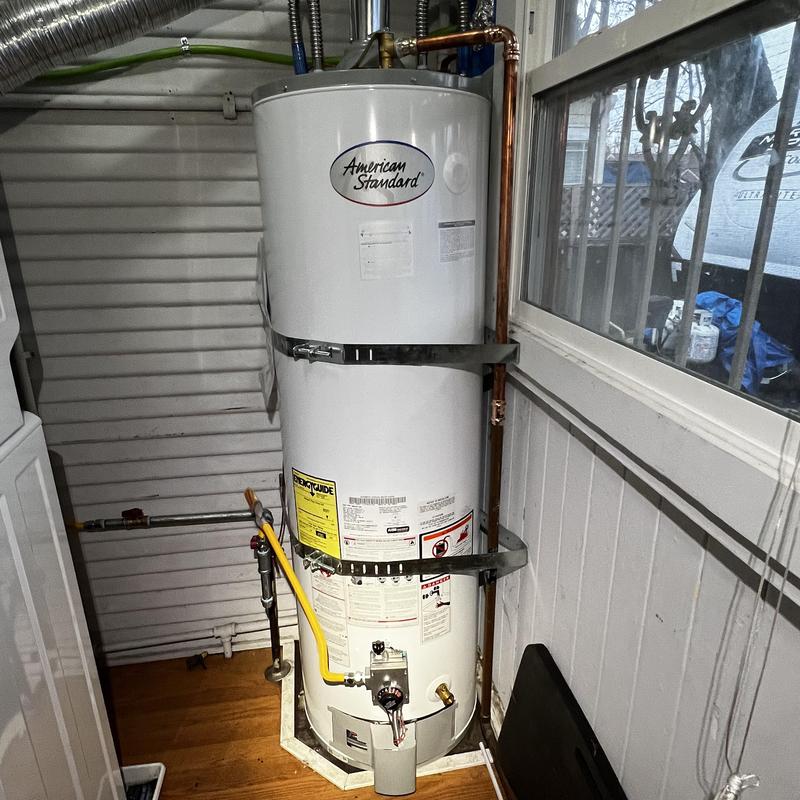 American Standard water heater with new piping installed