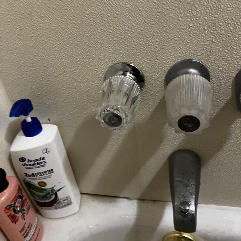 Shower valve hot side stem with plastic knobs