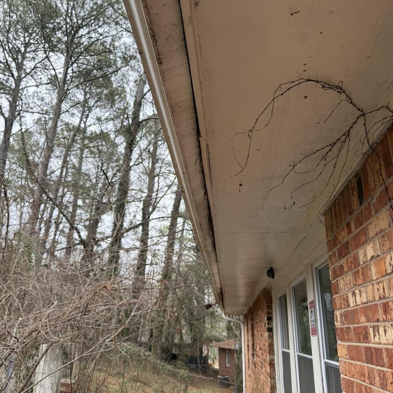 Gutter pulling away from house under soffit and roof edge