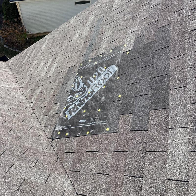 Asphalt shingle roof with protective underlayment installation