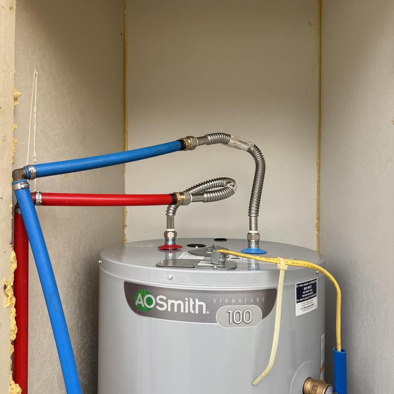 Electric water heater with new ball valves and flex lines