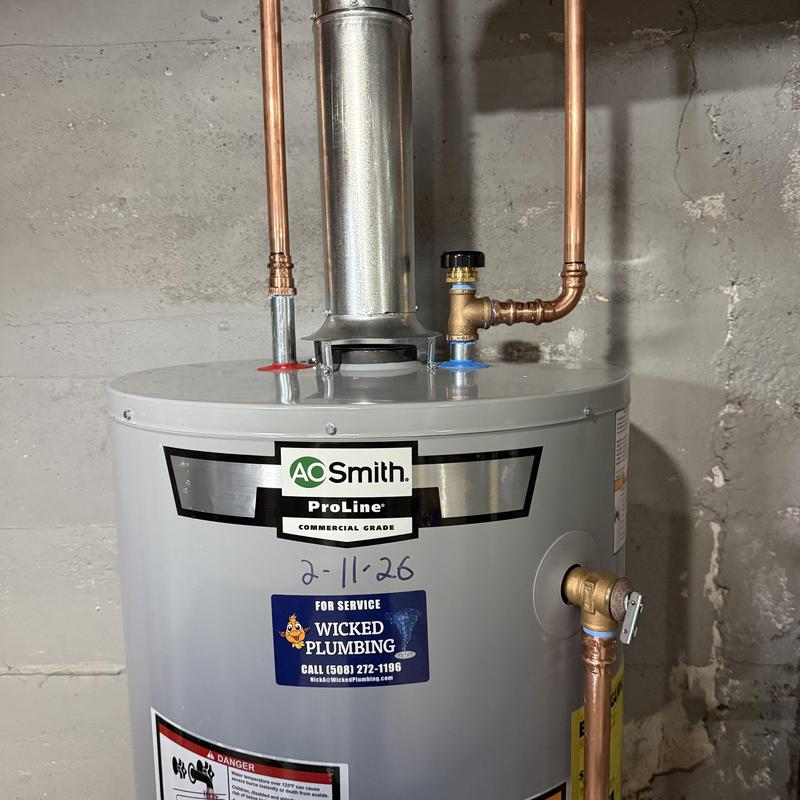 Water heater with new copper piping in basement Water heater with new copper piping in basement