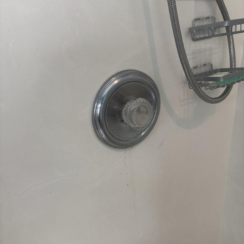 Shower control valve cartridge with handle and hose rack