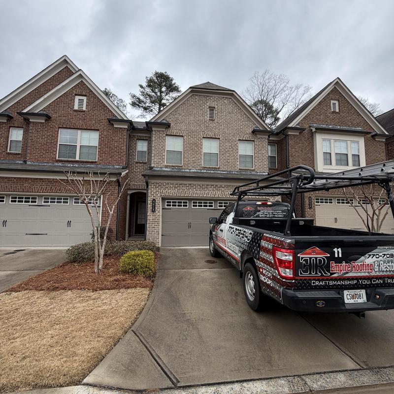 3-tab roof with tarp over missing shingles