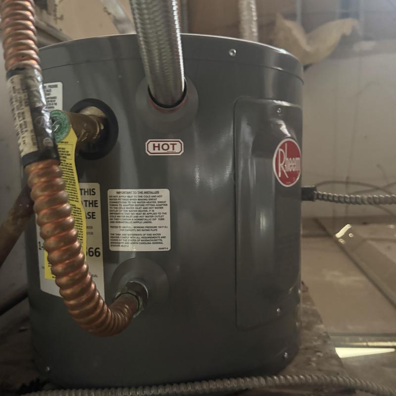 5-gallon Rheem water heater with piping connections
