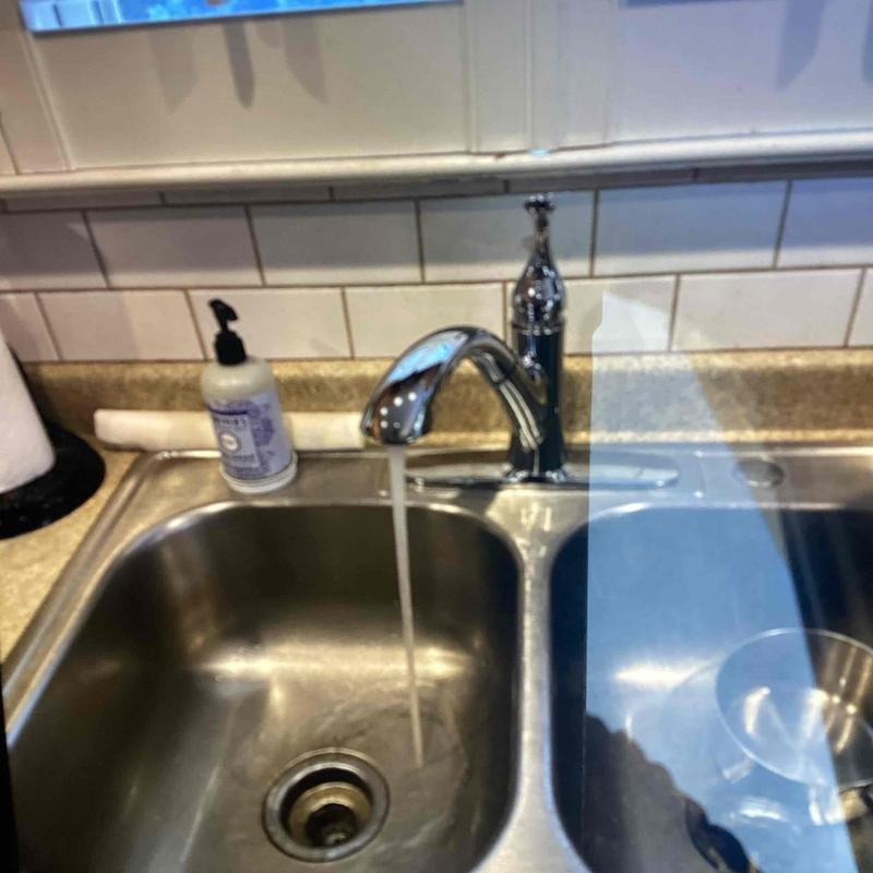Kitchen sink faucet with running water installation