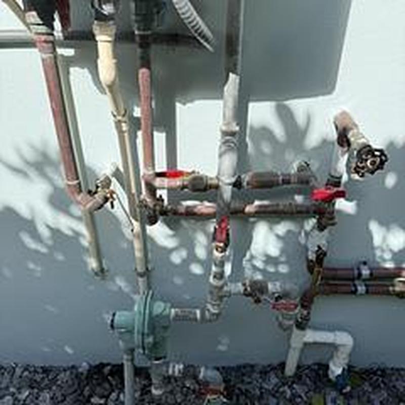 Tankless water heater gas and recirculation pipes inspection