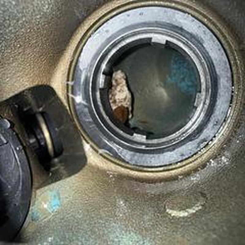 Backflow preventer valve interior with rust and debris