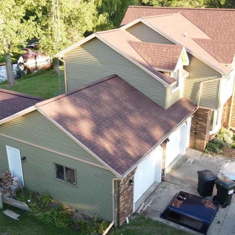 CertainTeed Monogram D-4 vinyl siding and aluminum gutters