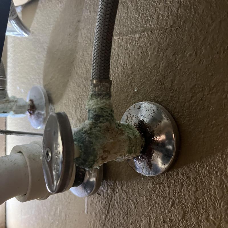 Angle stop valve with corrosion buildup on fitting