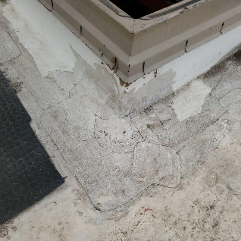 PVC roofing system with cracking and seam damage PVC roofing system with cracking and seam damage