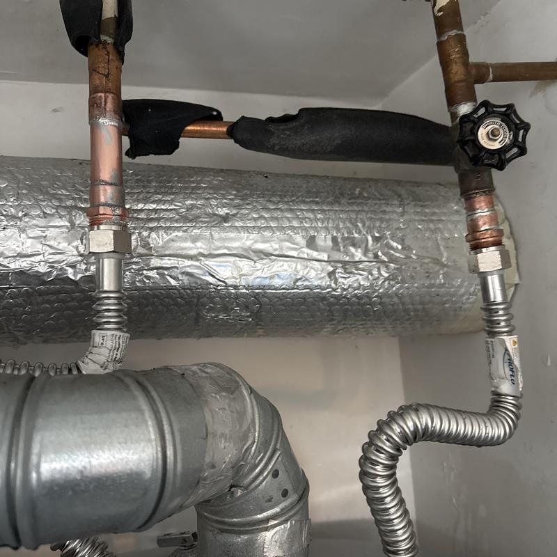 Water heater gas and water supply lines installed