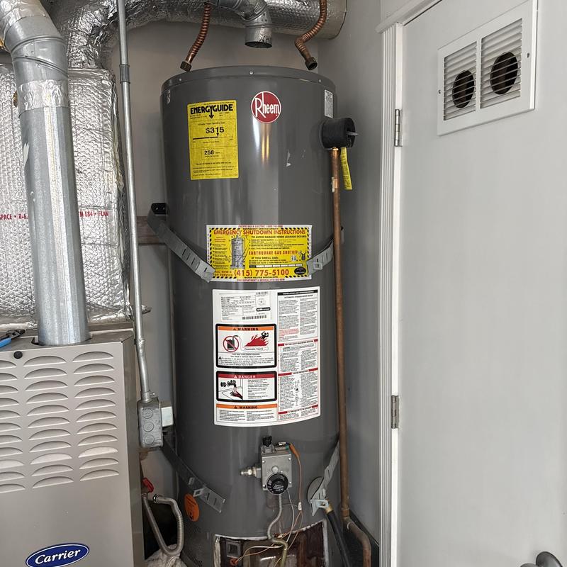50-gallon Rheem water heater with gas and water lines