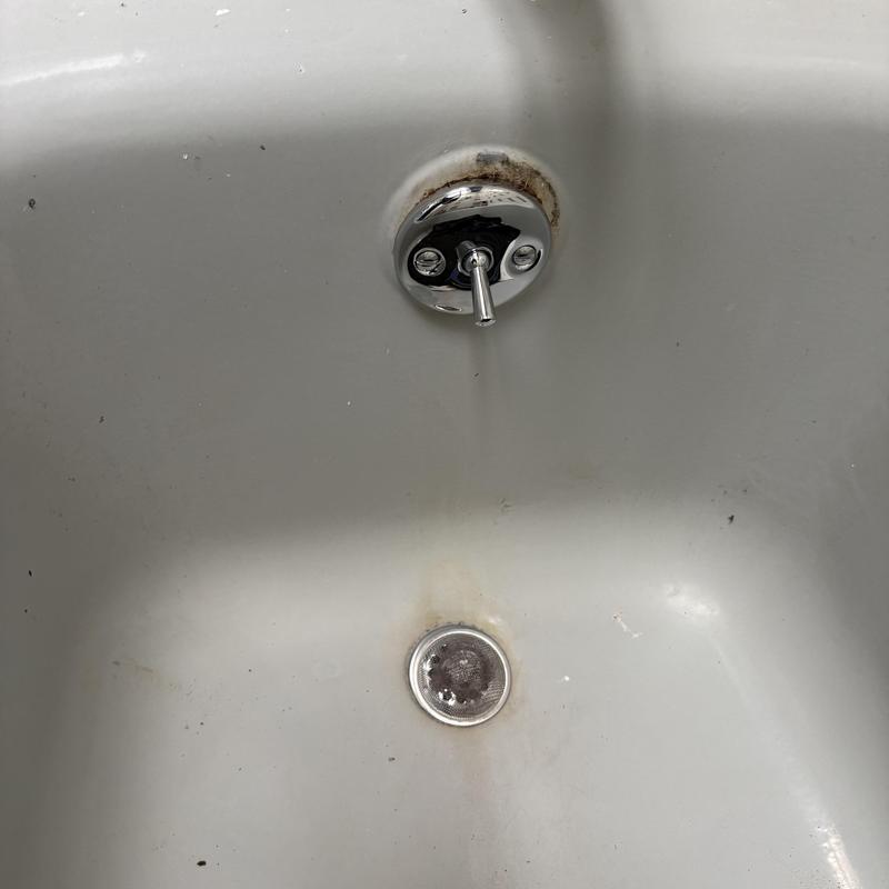 Tub waste and overflow assembly in bathtub basin