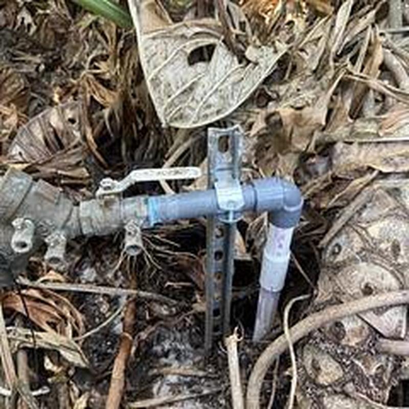 Backflow assembly with PVC pipe and valve in ground