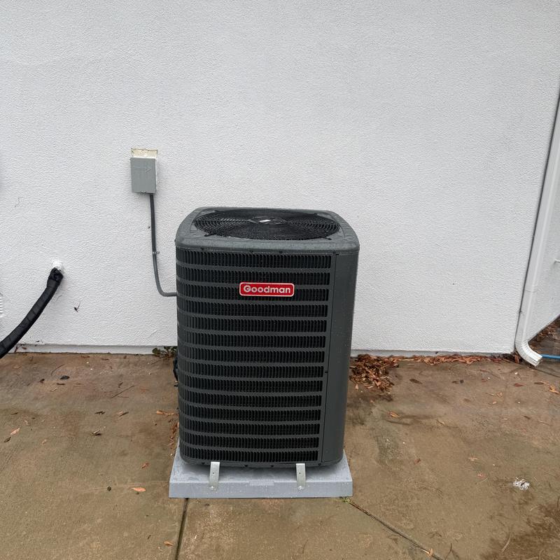 Goodman 3 ton R32 air conditioner on concrete pad