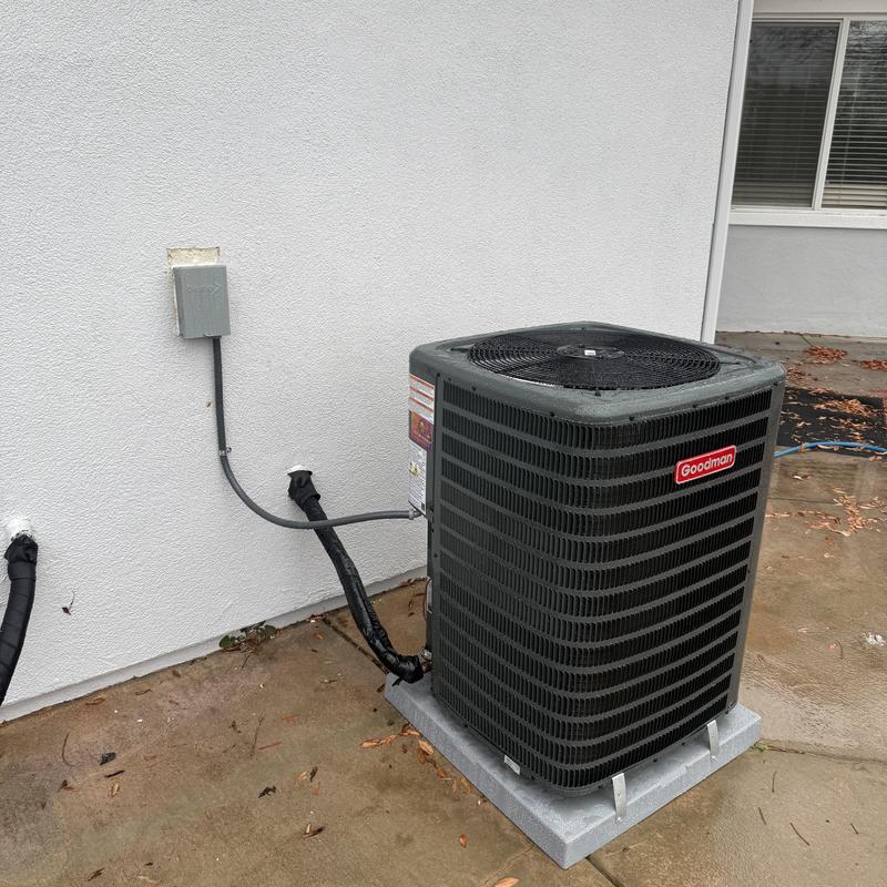 Goodman 3 ton R32 air conditioner on pad outdoors