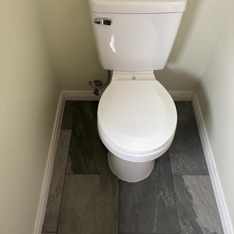 Toilet with 14 turn angle stop and stainless steel supply line Toilet with 14 turn angle stop and stainless steel supply line