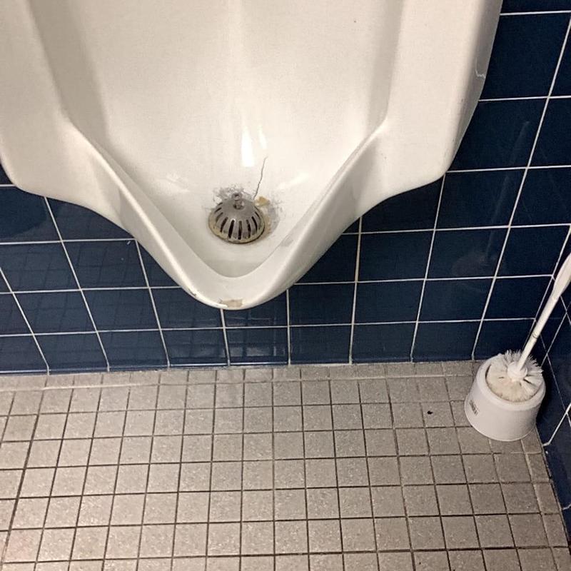 Urinal drain line installation with cracked urinal fixture