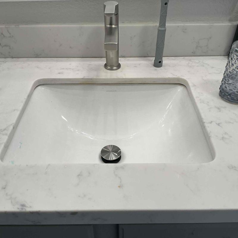Bathroom sink faucet with pop-up drain assembly
