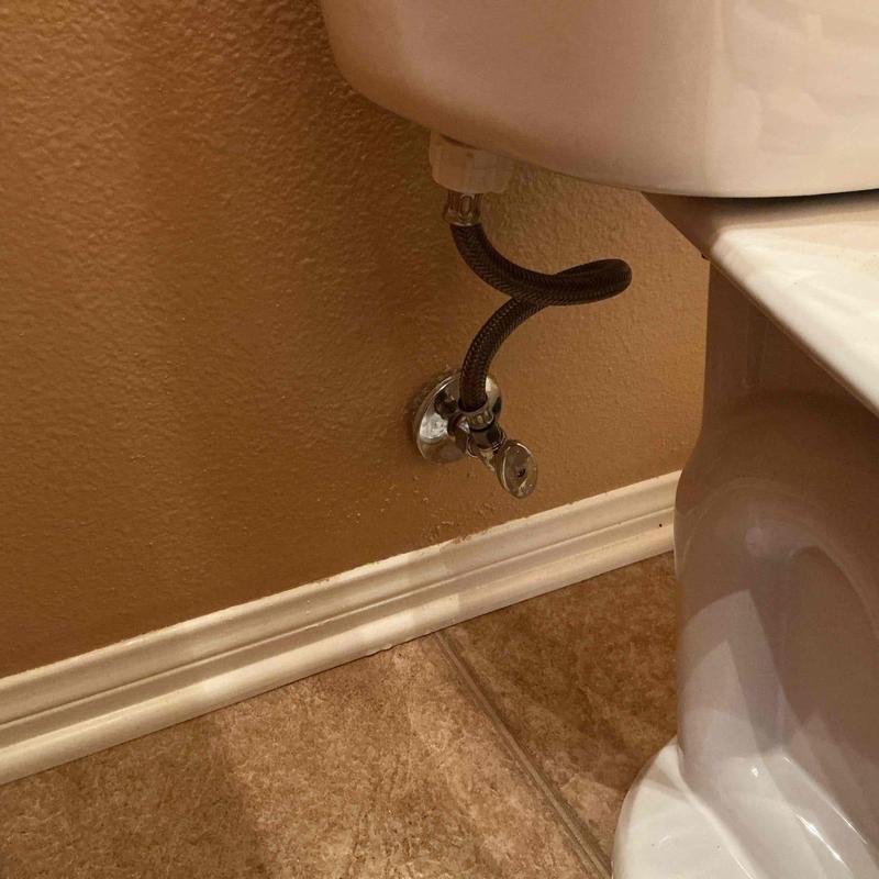 Toilet water supply valve and hose connection