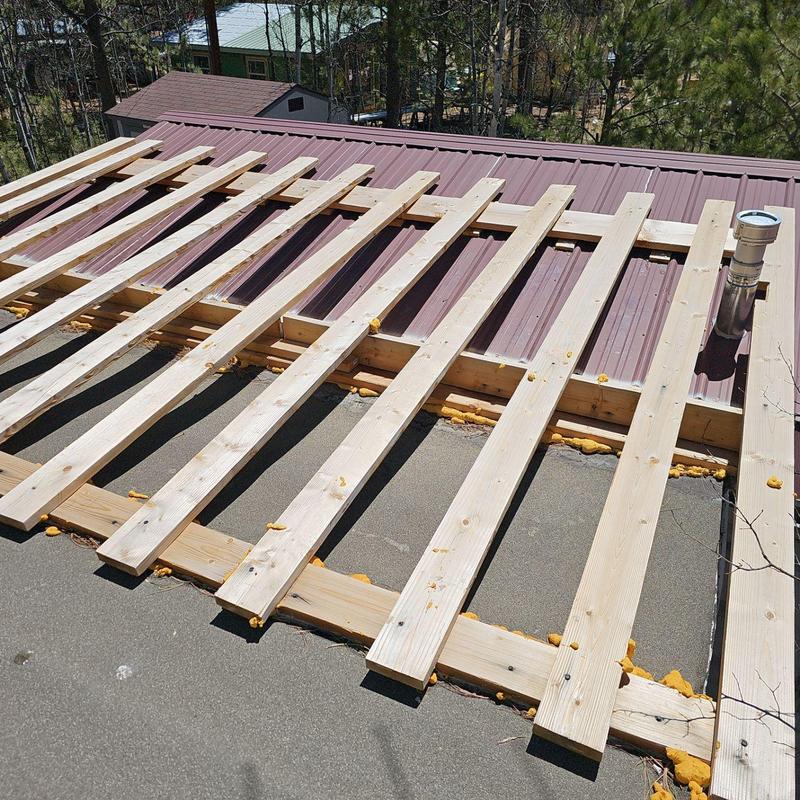 Metal roof framing with wooden supports installation Metal roof framing with wooden supports installation