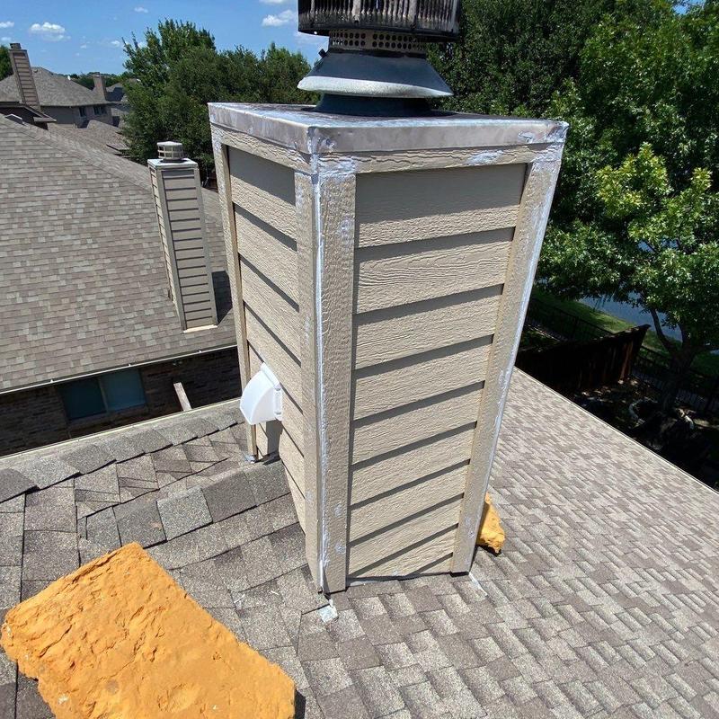 Chimney chase with new LP SmartSide siding and trim Chimney chase with new LP SmartSide siding and trim