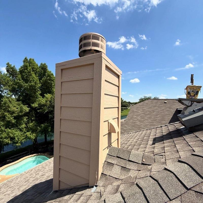 Chimney chase with new LP SmartSide siding and trim Chimney chase with new LP SmartSide siding and trim