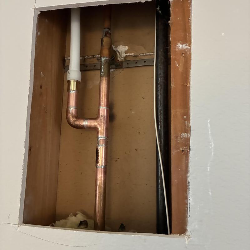 Copper hot water pipe reroute inside wall cavity Copper hot water pipe reroute inside wall cavity