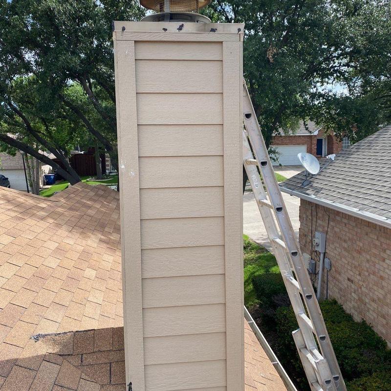 Chimney chase with new LP SmartSide siding and trim Chimney chase with new LP SmartSide siding and trim