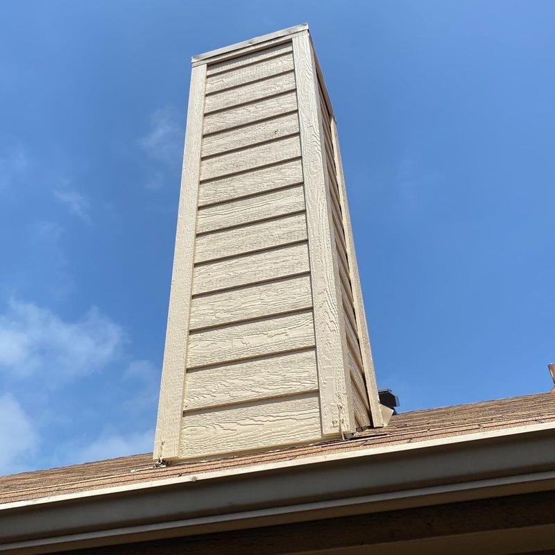 Chimney chase with new LP SmartSide siding and trim Chimney chase with new LP SmartSide siding and trim