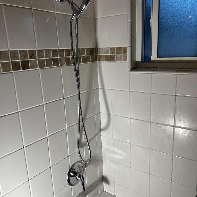 Tub and shower valve with new handheld shower handle