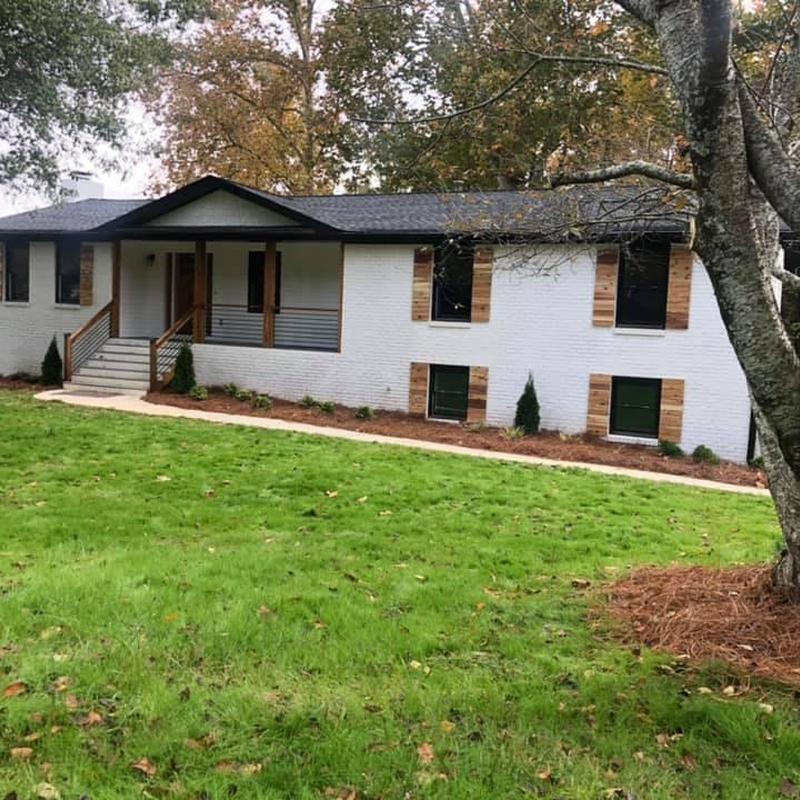 Asphalt shingle roof on white brick house in Marietta