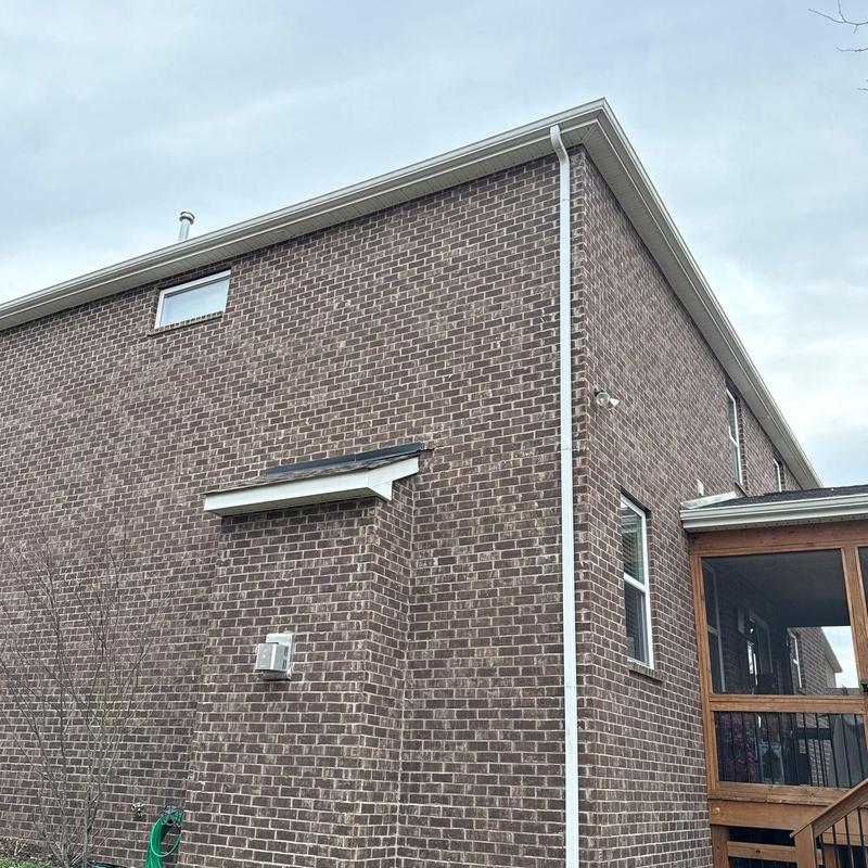 Asphalt shingle roof with ridge cap and flashing inspection