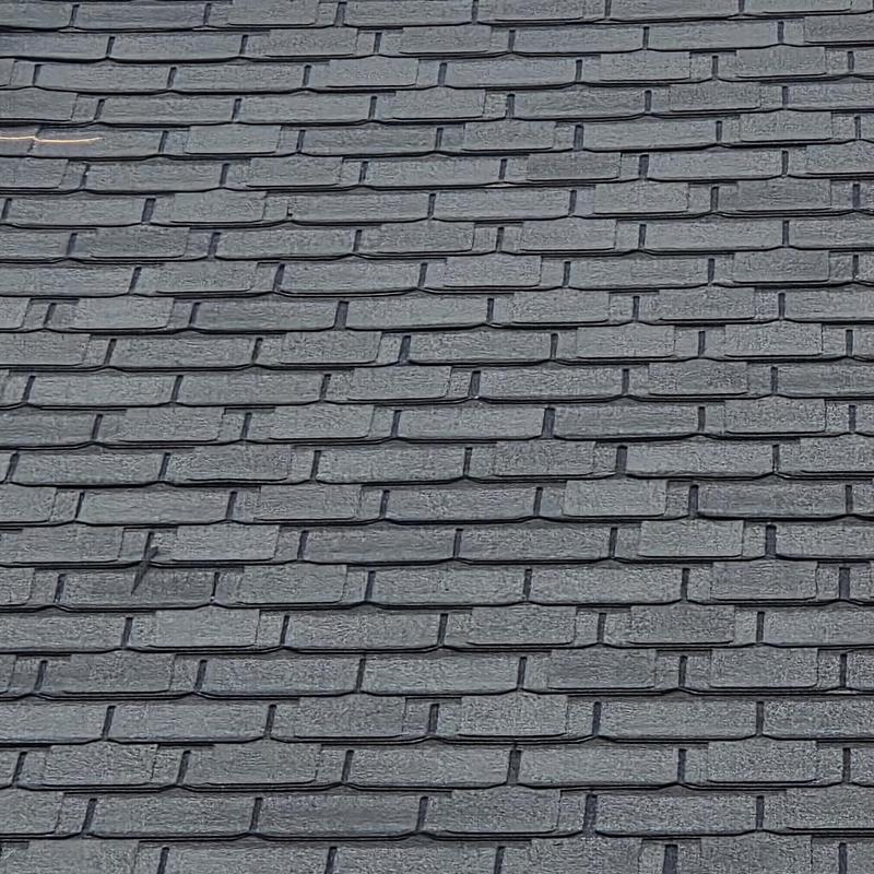 Architectural asphalt roof shingles with wind and hail damage