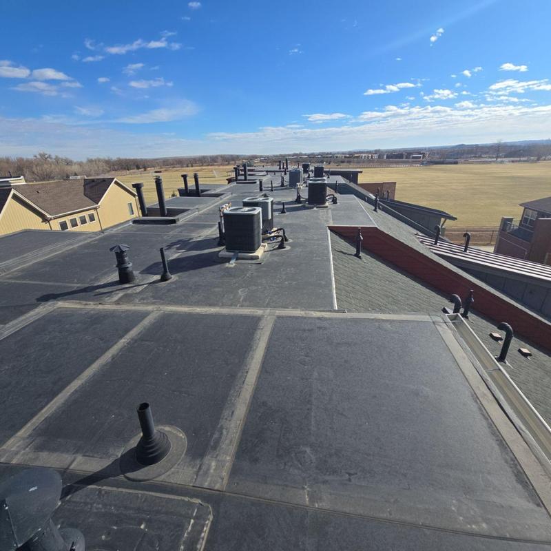 EPDM flat roof with HVAC units and vents EPDM flat roof with HVAC units and vents