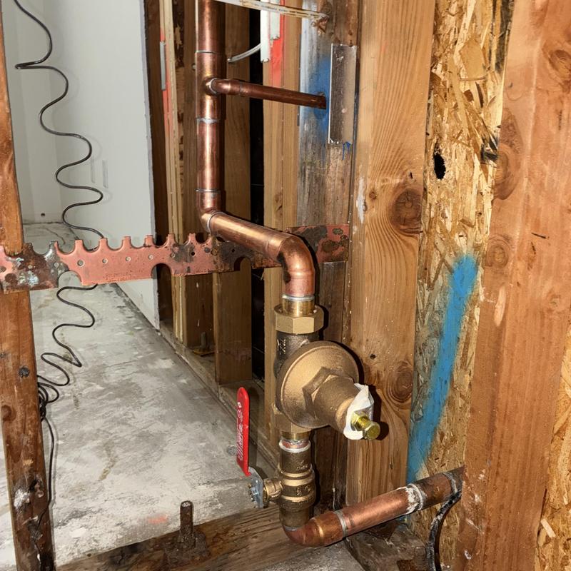 Copper main water line and pressure regulator installation