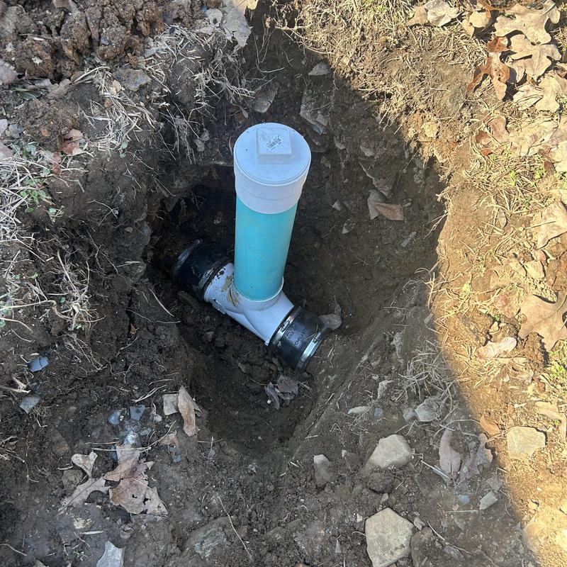 Two-way cleanout installation on mainline sewer pipe