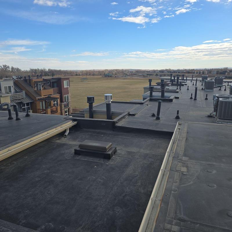 Flat roof with vents and HVAC units in Boulder CO Flat roof with vents and HVAC units in Boulder CO