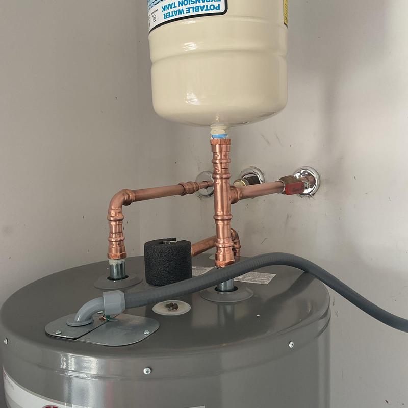 Rheem 50-gallon electric water heater plumbing installation