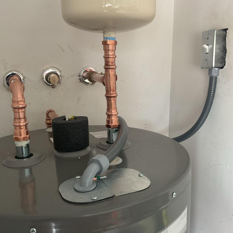 Rheem 50-gallon electric water heater with copper piping