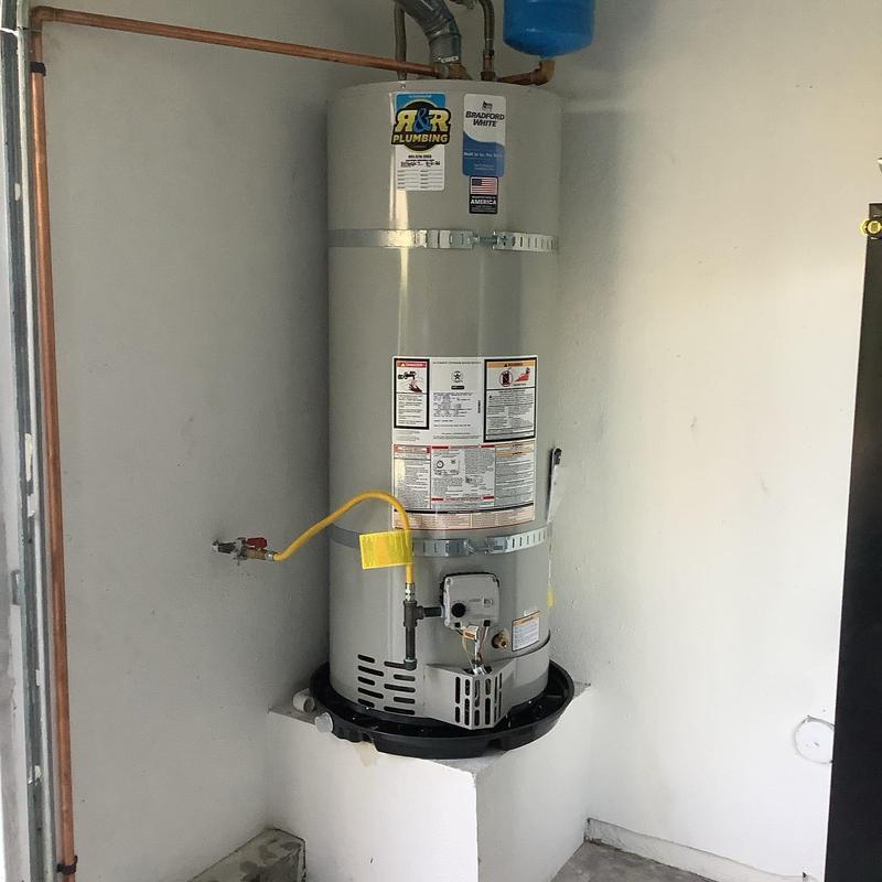 Water heater with expansion tank and gas line installation