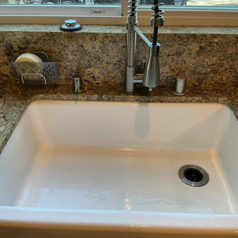 Kitchen faucet with spring coil pull-down sprayer installed